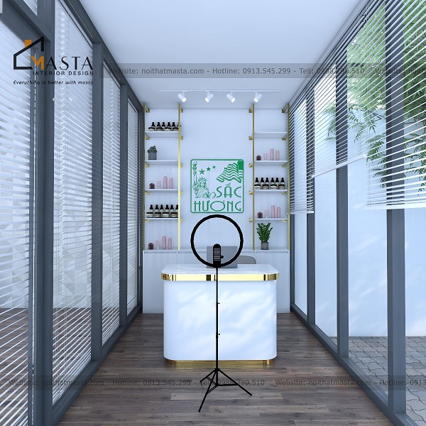 Khu vực livestream sử dụng ánh sáng từ bên ngoài kết hợp viền inox mạ vàng để tạo điểm nhấn cho không gian