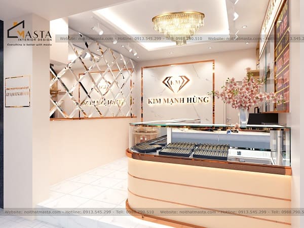 Decor kính thủy mài kết hợp viền inox mạ vàng hồng tạo hiệu ứng lung linh cho tiệm vàng